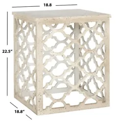 Inspired by intricate Moroccan architecture, the open, distressed white lattice of this Lonny End Table brings an airy...