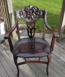 American late 1800s early 1900s. this piece for age is in extremely nice condition. The chair is sturdy and please zoom...