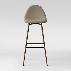 Designed in clean simple lines that allude to the Mid Century décor, this stool is perfect for any style. The stool...