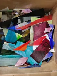 10-12 lbs Stained glass scrap for mosaics. 10-12 lb mixture of sizes, colors, and textures. Each box is different, but...