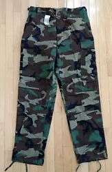 USGI Battle Dress Uniform. New Military Issue Woodland Camo Pants. These trousers are part of the retired military...