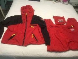 Marlboro lightweight windbreaker rain jacket and rain pants adult size XL. Bright red and black colors, full zip,...