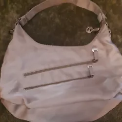 used condition, extra strap to wear as crossbody.