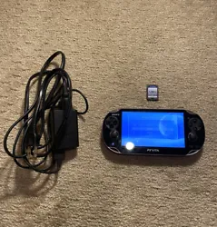Sony PlayStation PS Vita Console PCH-1001 W Charger And MLB The Show 14. Condition as shown.