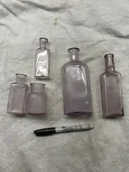 Ground dug up bottles. Overall in nice condition. Some small chips on rims of 3 bottles. Thank you for...