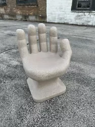 For sale is a NEW GIANT right Hand Shaped Chair. The plastic has a stone-like appearance. The color of the chair...
