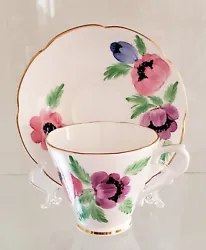 VINTAGE COLLINGSWOOD ENGLISH BONE CHINA GOLD TRMMED FLORAL PATTERN  CUP AND SAUCER. Displayed only. Gold trim is hand...