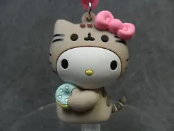 Hello Kitty and Pusheen -- the best of both worlds! Put them on your bag, keys, purse -- wherever you want! Hello Kitty...