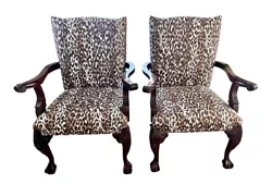 Beautiful matched set of heavily carved mahogany chairs with new upholstery.