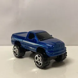 MBX052DODGE RAM SRT10 MODEL BY MATCHBOX COLLECTIBLES. FINISHED IN BLUE METALLIC PAINT, BLACK ACCENTS, AND BLACK...