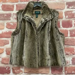 Collared neckline, hook and eye front closure, faux fur, fluffy texture, side pockets, interior pouch pocket, lining,...