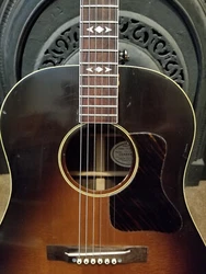 Made in 1991 (Bozeman, MT). Strung with Martin Retro. 012s. All original with the exception of the strap pin. Im the...
