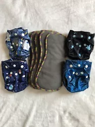 Newborn Size Cloth Diapers and Inserts. 4 pocket diapers with bamboo charcoal inserts. Barely used, in good condition....