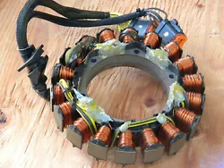 FROM A 150 FICHT V-6. EVINRUDE BRP LOW HOUR STATOR ASSEMBLY, ELECTRICAL COMPONENT.