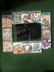 Sony PlayStation 3 (PS3) Console - Noire avec manette + 12 jeux en( bon état de marche ).