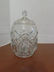 I have an EAPG Clear Glass Biscuit or Cookie Jar. It has a Peacock Feather Pattern. It has a tiny nick on the inside...