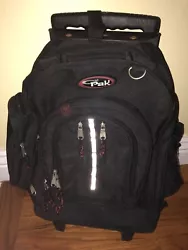 Cal Pak Rolling Luggage Backpack CARRY ON Multi Compartments Black Red 3M. Condition is Pre-owned. Shipped with USPS...