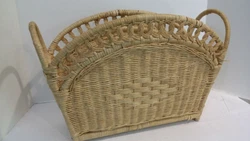Nice wicker magazine basket. A few loose spots on the Wicker. Could be reinforced with a little wood glue.