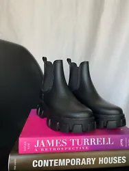 Super cute Jeffrey Campbell black platform boots! Perfect for fall/winter, as they are pull-on and water resistant....
