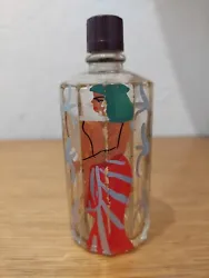 Ancien flacon de parfum vide, epoque  Art Deco vers 1930. Flacon en verre peint décor femme. Bouchon bakélite. ...