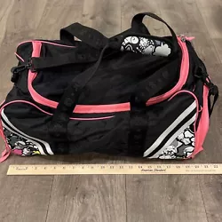 This Hello Kitty duffle bag is a rare find from the 50th anniversary collection. The exterior is adorned with black and...