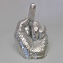 An exclusive rhodium-plated object by world-renowned artist Ai Weiwei. Year: 2017. ARTIST’S HAND. LIMITED EDITION OF...