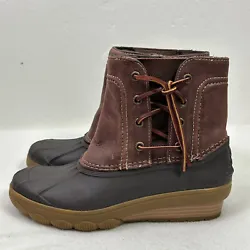 Leather upper. I think it is call “gum” sole. Slight wedge. Lace-up side with leather laces. Interior zipper with...