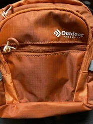 Has a place for 2 water bottles on the sides. It’s bright with reflective stripes for easier visibility.