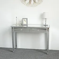 This is our 2 drawers glass mirrored accent side table, which has a beautiful appearance. With its mirrored finish, it...