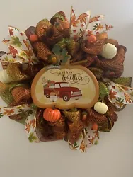 • This is a Brand new. Fall pumpkin truck Mesh Wreath. I used a very pretty orange and red ombré deco mesh on a wire...
