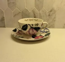 This beautiful Spode teacup and saucer set features the Flower of the Month design for April. The colorful flowers are...
