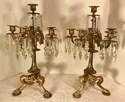 With Period Cut Glass Crystal Prisms. Each having a cylindrical stem and issuing the five foliate scroll candle arms,...