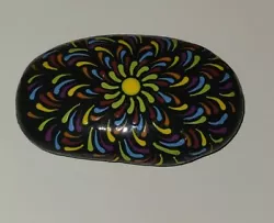 Up for sale is a unique and one of a kind rock painting of anabstract art color burst on a rock with black background....