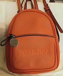 Preowned GUESS Backpack Handbag Purse Tiger Orange.  Imperfections where back strap meets bag and a few spots inside...