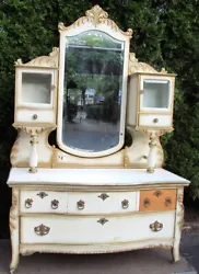Very unusual and pretty style oak princess dresser. All of the large original brass hardware is 100% complete as well...