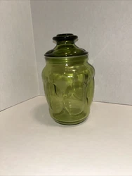 This unique vintage glass canister from L E Smith features a beautiful avocado green color and abstract pattern. The...