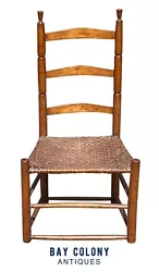 The chair has a 3 slat back with pretty dramatic curves that can be best seen in the side profiles. The rear stiles...