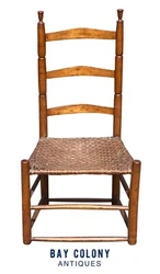 The chair has a 3 slat back with pretty dramatic curves that can be best seen in the side profiles. The rear stiles...