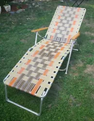 Vintage Aluminum Folding Webbed Chaise Lawn Lounge Chair Woven Wood Arm Rests.