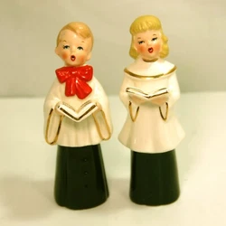 Add a touch of vintage charm to your holiday decor with this set of two ceramic figurines from Fine A Quality Japan....