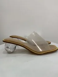 Elevate your style with these chic Fashion Nova clear sandals. Perfect for any occasion, these slip-on heels feature a...