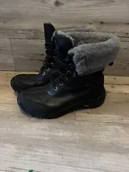 Elevate your winter shoe game with these stylish UGG Australia Adirondack combat boots in classic black. Made of...