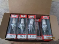 Part Number RCJ8 / 840. Genuine Champion Spark Plugs / Box of 9. We try and notate any imperfections we see, however we...