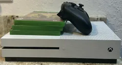 Microsoft Xbox One S 1TB Console - White. Does have scratches and marks but works as supposed to with no...