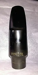 Ponzol Alto Saxophone Mouthpiece. Great pre-owned condition. No visible nicks on beak, tip or rails. Ligature not...