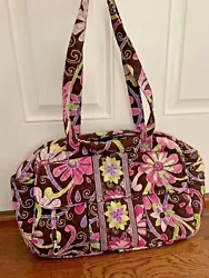 Darling paisley diaper bag! Fully lined, easy to wipe down inside. Zipper pouch on the back with a changing pad inside...