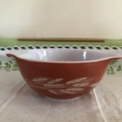 Vintage Pyrex Cinderella Orange Wheat Bowl 442 9 1/4 X 7 1/2. Good condition with no cracks or chips but does have some...