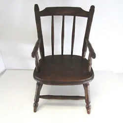 Condition: Antique 19th century miniature wooden doll chair with bamboo style turned wood spindles. There are several...