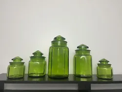 Five green apothecary panel jars with lids. Jar sizes.