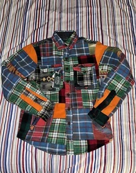 Up for sale is a Ralph Lauren Patchwork Flannel Shirt Jacket in size XS. “Country Patchwork”. This shirt jacket...